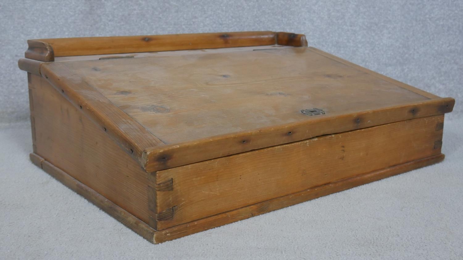 A pine clerk's writing slope with galleried top and hinged lid enclosing storage compartment. H.23 - Image 3 of 4