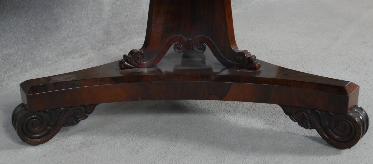 A Regency rosewood tilt top dining table on acanthus scroll carved pedestal and platform base. H. - Image 3 of 6