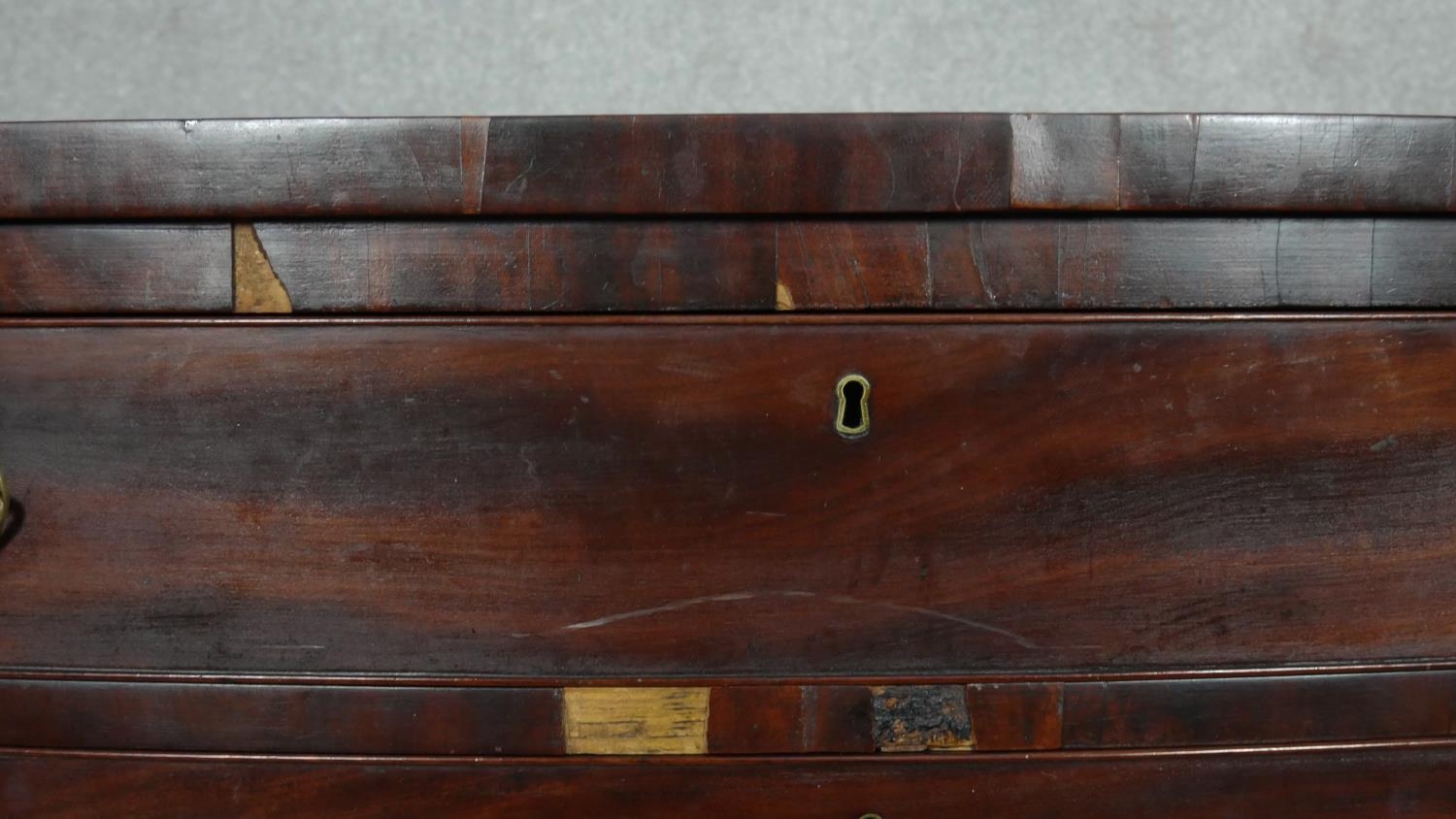 A 19th century mahogany bowfronted chest of four long drawers flanked by reeded pilasters on - Image 5 of 10