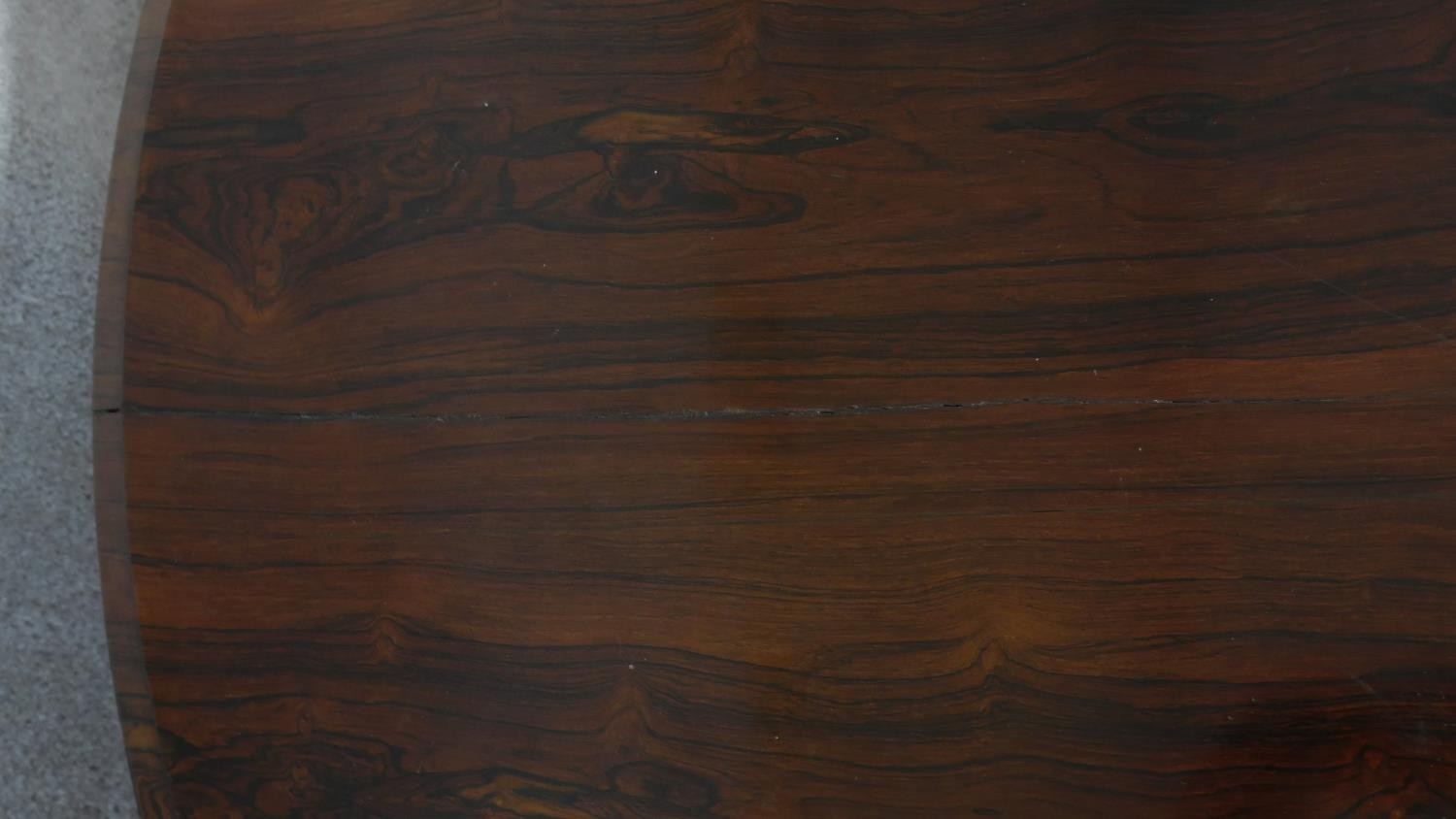 A Regency rosewood tilt top dining table on acanthus scroll carved pedestal and platform base. H. - Image 5 of 6