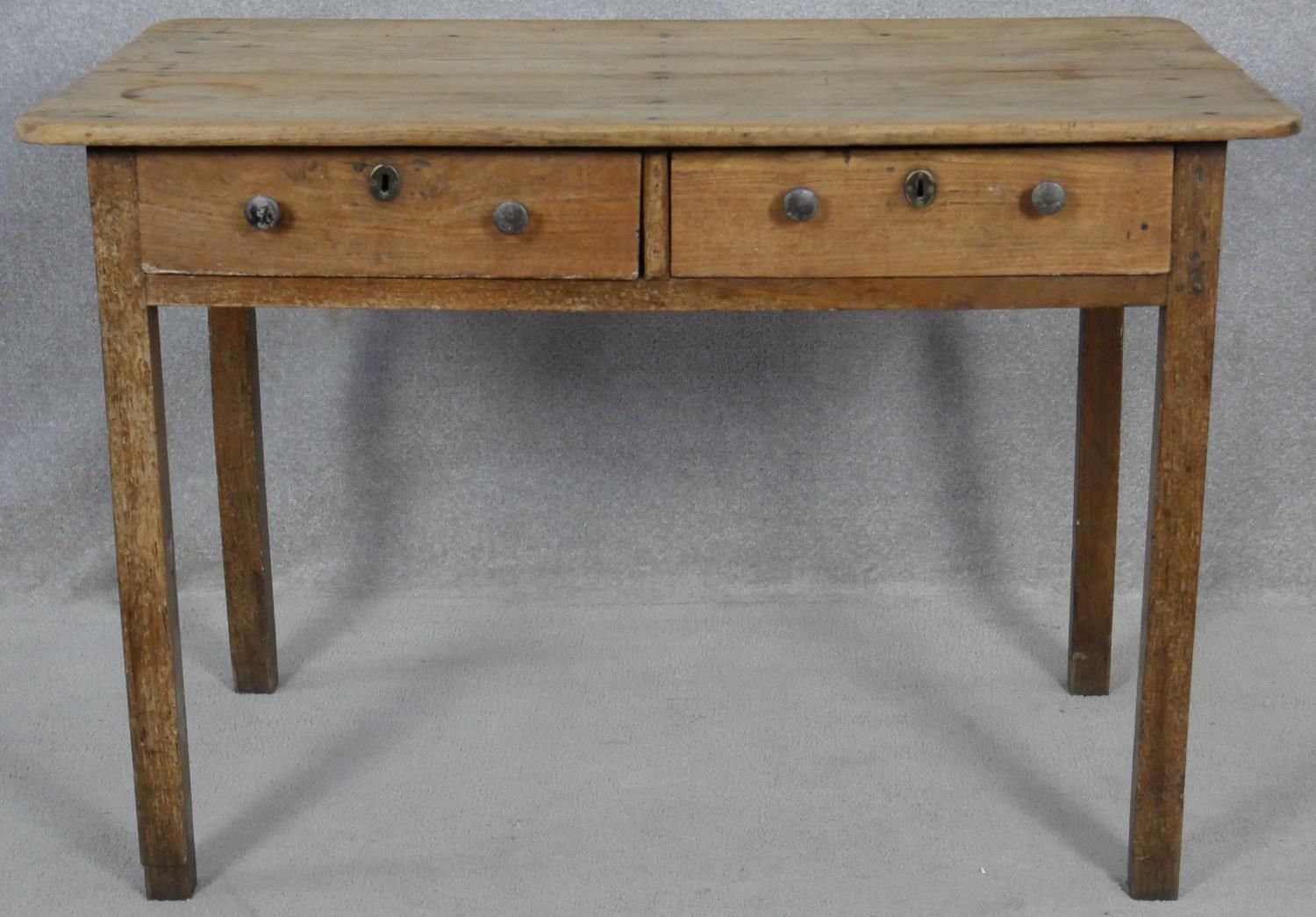 A 19th century fruitwood side table with a pair of frieze drawers on square section supports. H.77