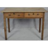 A 19th century fruitwood side table with a pair of frieze drawers on square section supports. H.77