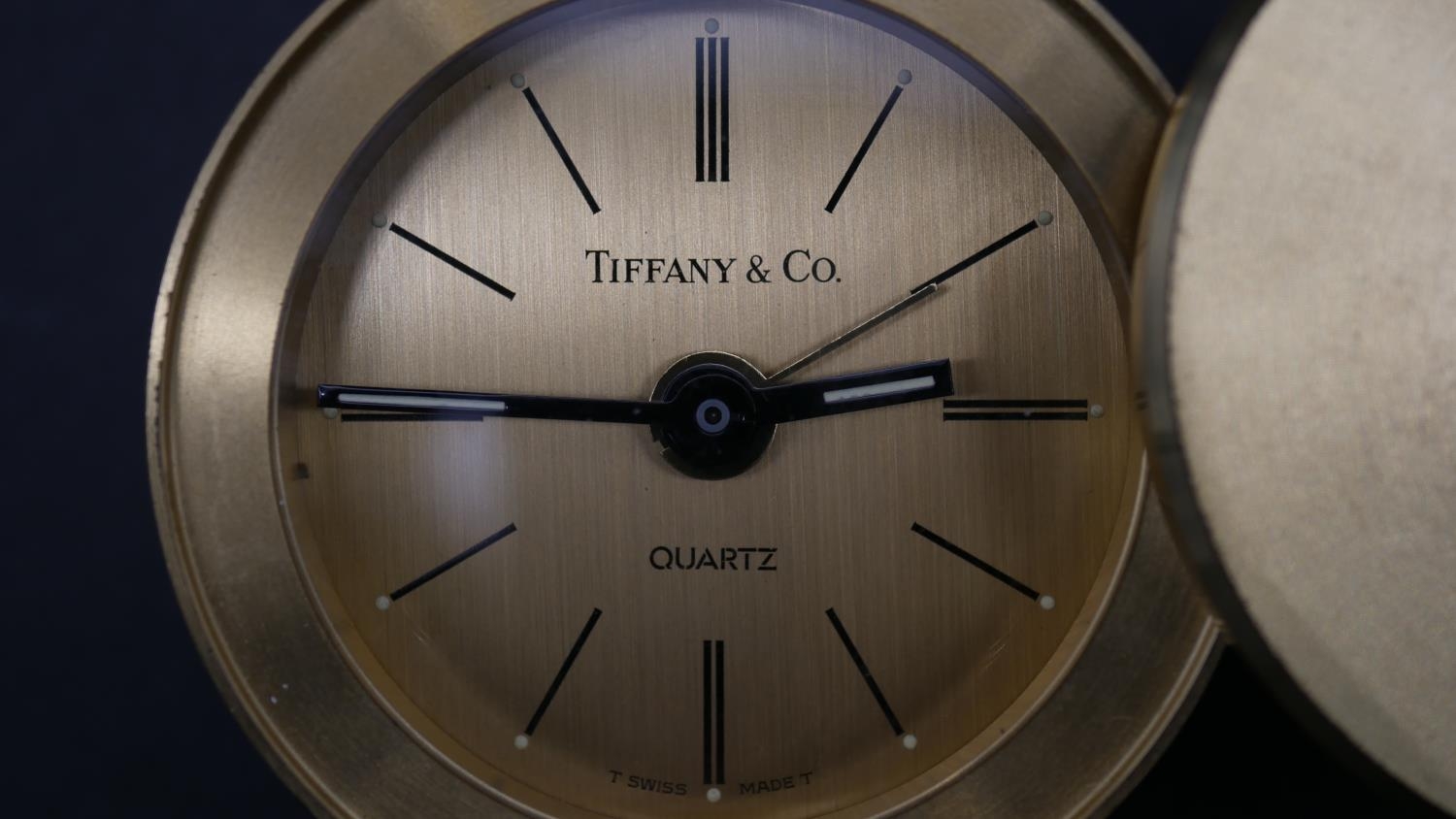A Tiffany & Co. miniature portable alarm clock with Merrill Lynch logo to the sliding case cover, - Image 2 of 5