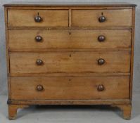 A 19th century mahogany chest of drawers with knob handles on bracket feet. H.100 W.110 D.50cm