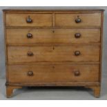 A 19th century mahogany chest of drawers with knob handles on bracket feet. H.100 W.110 D.50cm