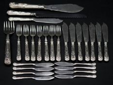 A silver fish serving set for seven people. Including eight small fish knives, a fish serving set,