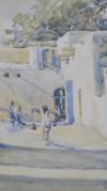 A framed and glazed watercolour, North African street scene, unsigned. H.51 W.43cm