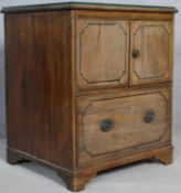 A Georgian pale mahogany ebony strung bedside cabinet with plate glass top on bracket feet.58.5 D.