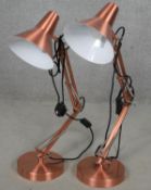 A pair of vintage style copper anglepoise desk lights. H.80cm (fully extended)