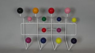 A mid century vintage atomic coat rack with full sphere multi-coloured ends. H.38 W.50cm