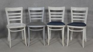 A set of four painted bentwood dining chairs. H.80cm (some damage as photographed).