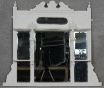 A late 19th century painted overmantel mirror with triple bevelled plates. H.87 W.101cm