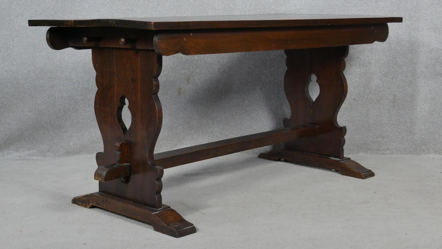 A Continental style refectory dining table on pierced stretchered trestle supports resting on a - Image 3 of 3