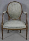 A 19th century carved gilt Louis XVI style open armchair in powder blue velour upholstery. H.91cm