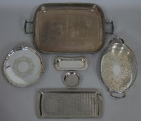 A silver plated twin handled tray along with a collection of five other silver plated trays and