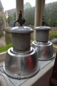 A pair of large industrial aluminium and metal spotlight shades and fittings. H.80cm (2)