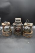 Three vintage railway lanterns. H.35 W.23cm (largest)