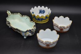 A Majolica style twin handled bowl, a pair of Italian flower pots and a similar Chinese style