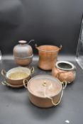 A miscellaneous collection of copper and brass cooking pots and vessels. H.30 Dia.20cm