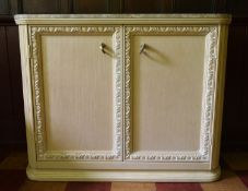 A contemporary kitchen island cabinet by Century with marble top and slides to each end above