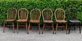 A collection of 6 country Windsor chairs with classical hoop back and spindles. H.65 W.36cm