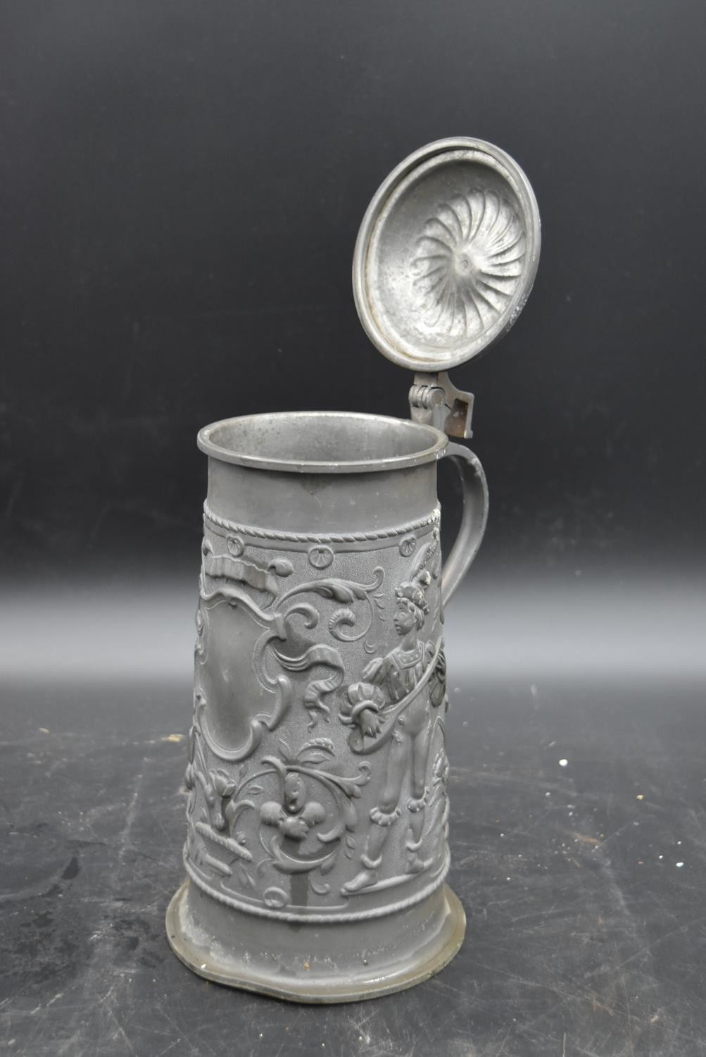 A pewter lidded tankard with relief decoration, a stoneware flagon, a lamp and large wooden pepper - Image 5 of 9