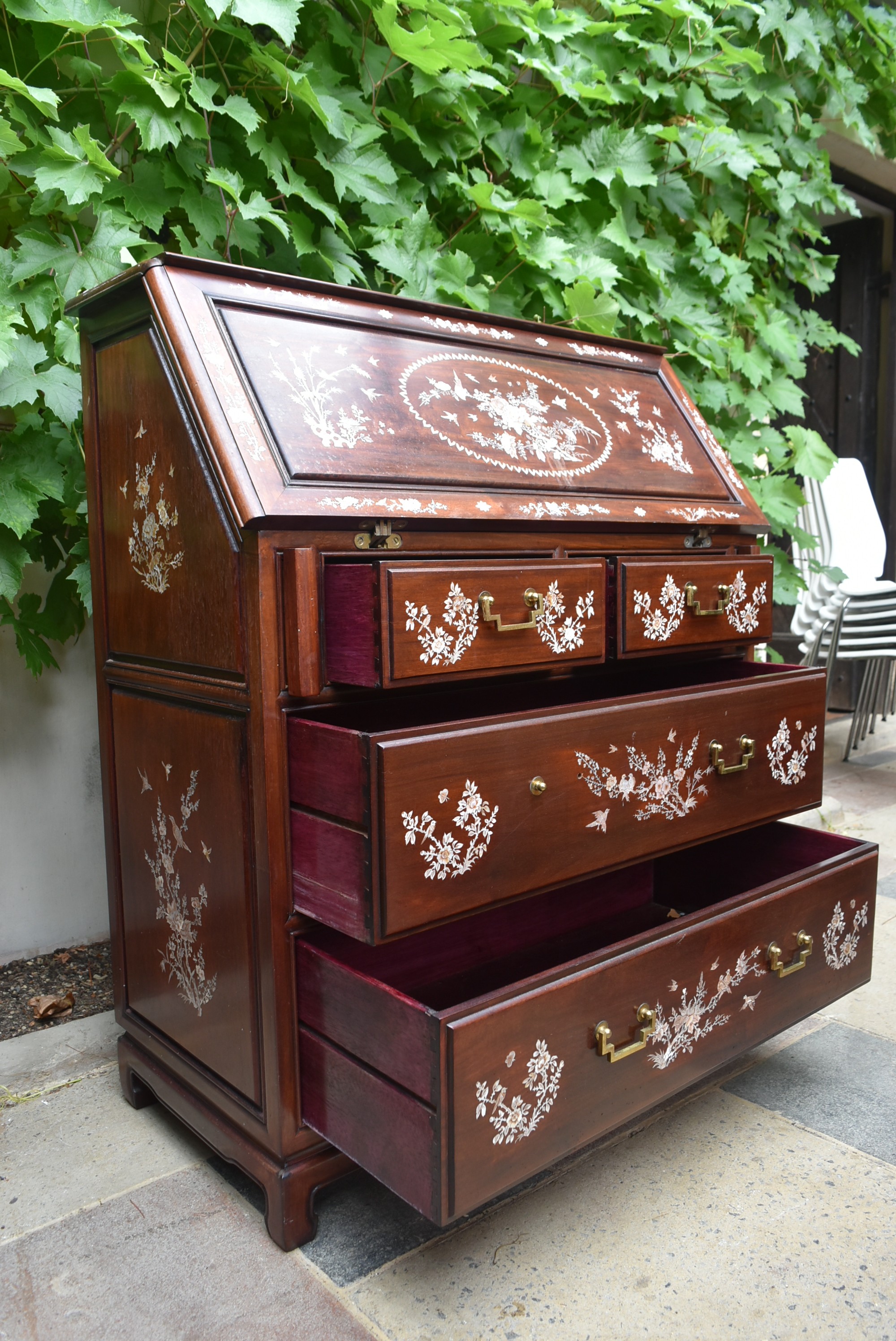 A Chinese hardwood bureau with fall front revealing fitted interior and with profuse all over mother - Image 2 of 6