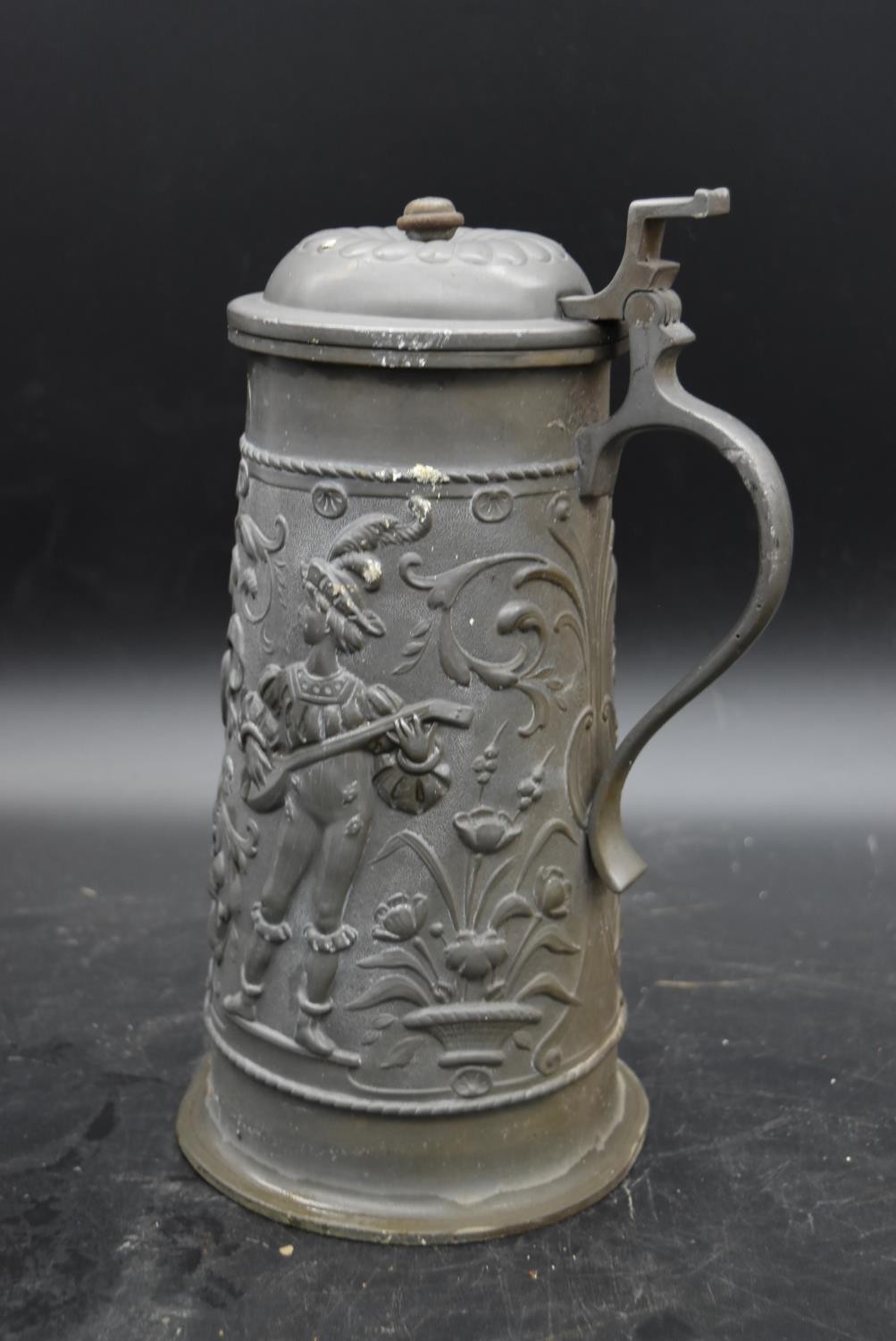 A pewter lidded tankard with relief decoration, a stoneware flagon, a lamp and large wooden pepper - Image 4 of 9