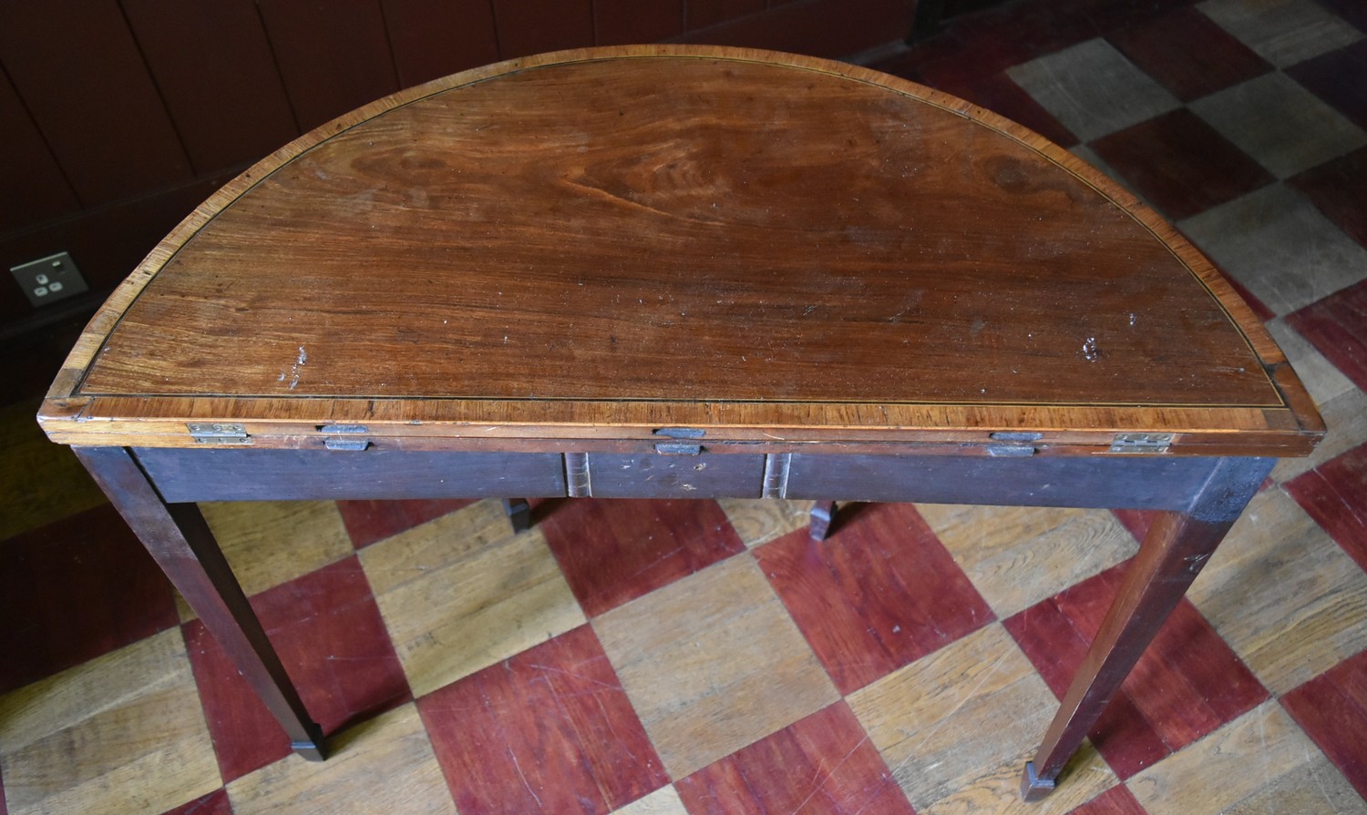 A Georgian mahogany and satinwood crossbanded demi lune tea table with fold over top on square - Image 4 of 4