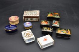 A Limoges porcelain pill box and a Limoges match box cover, a similar Herend example, a lidded