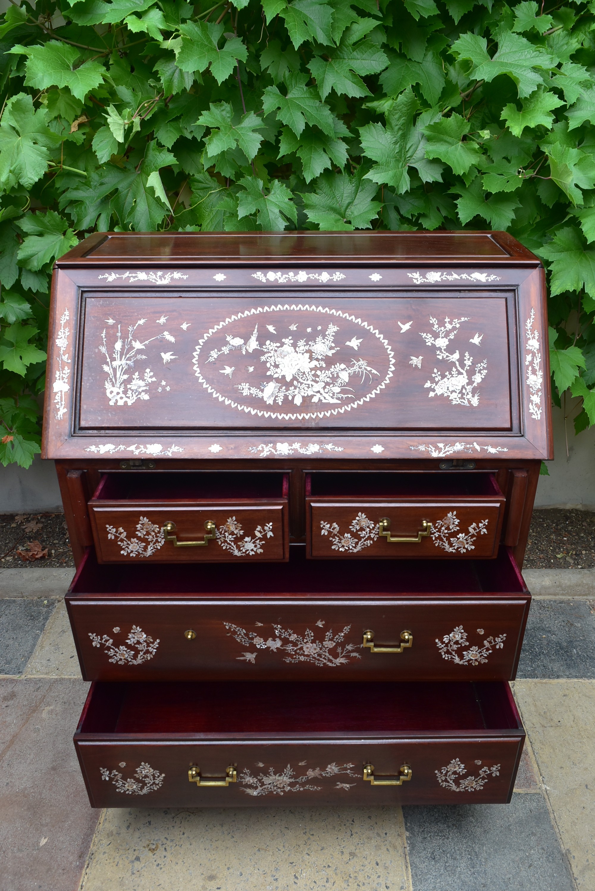 A Chinese hardwood bureau with fall front revealing fitted interior and with profuse all over mother - Image 4 of 6