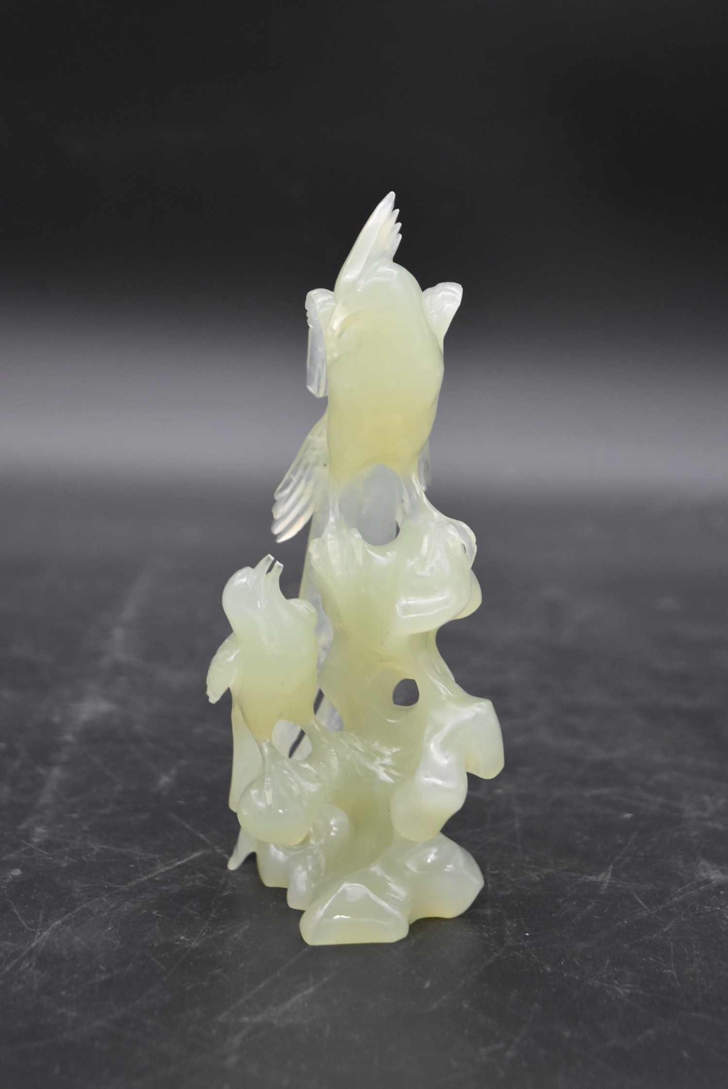 Two Chinese carved and pierced jade figure groups of song birds among blossom and foliage. One - Image 4 of 6