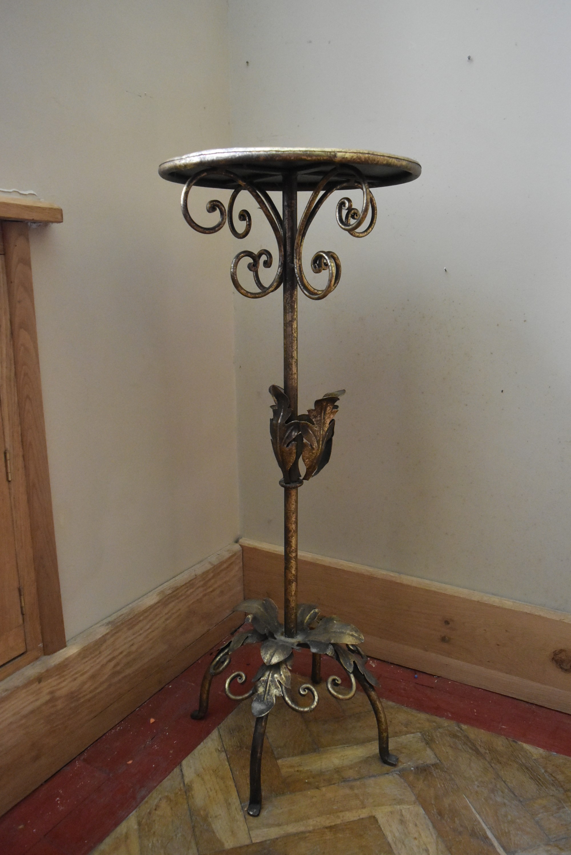 A metal and bronzed jardinière stand on scrolling floral tripod base. H.90 Dia.36cm