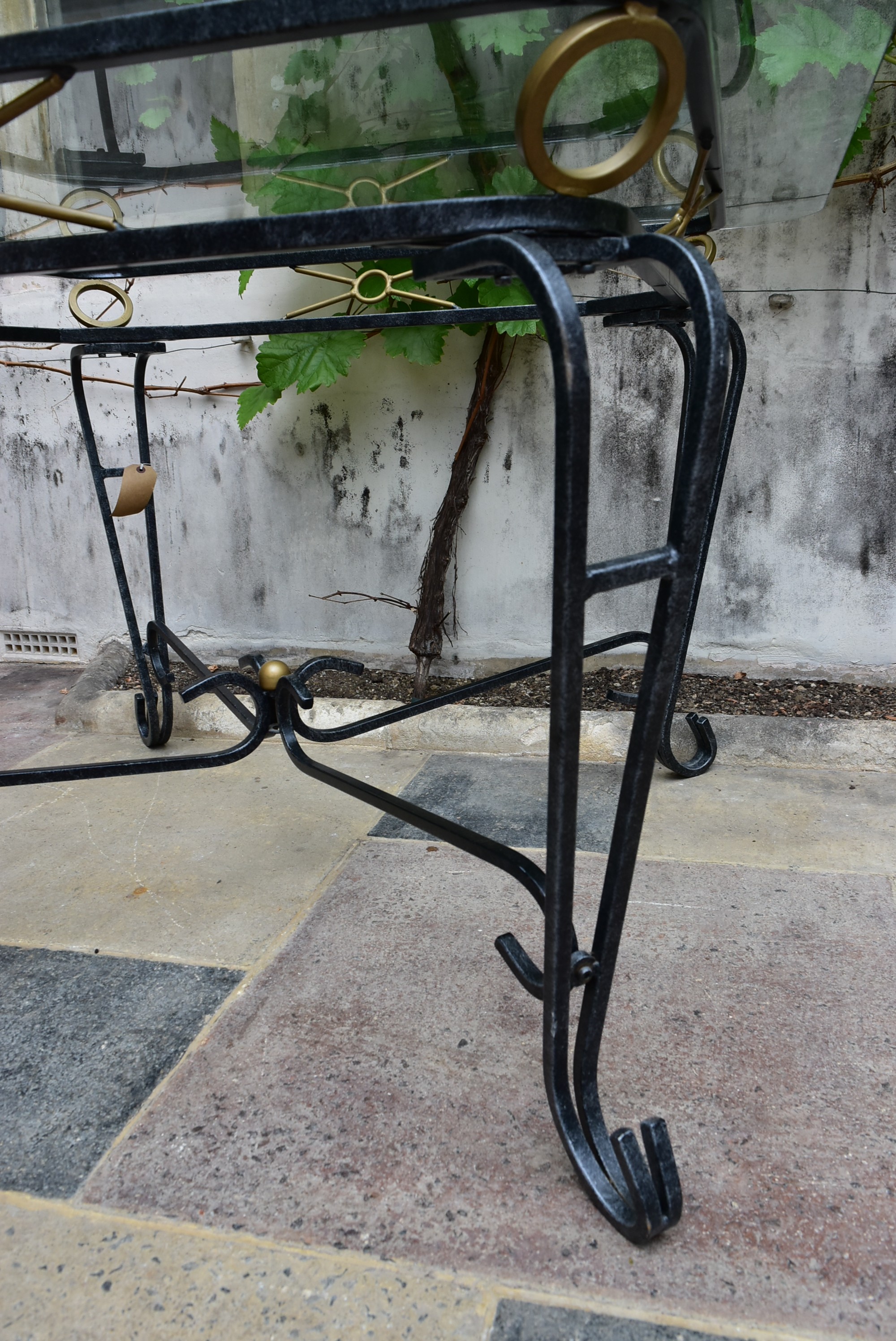 A wrought iron conservatory dining table with bevelled plate glass top. H.73 W.115cm - Image 3 of 5