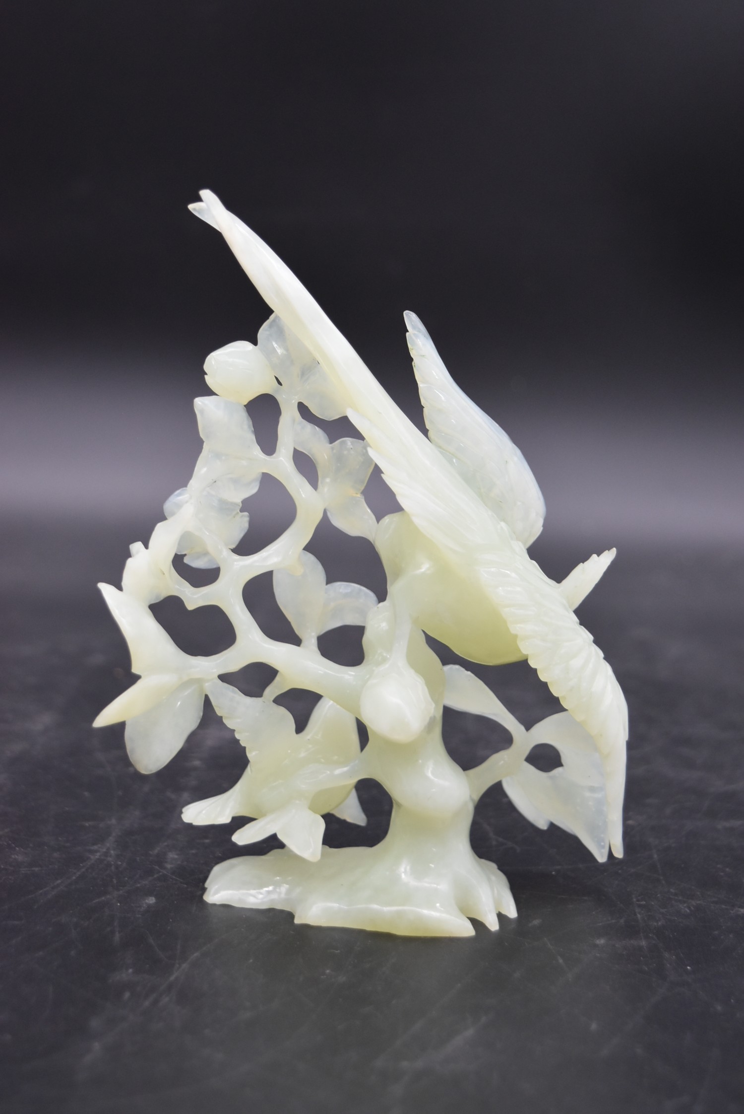 Two Chinese carved and pierced jade figure groups of song birds among blossom and foliage. One - Image 3 of 6
