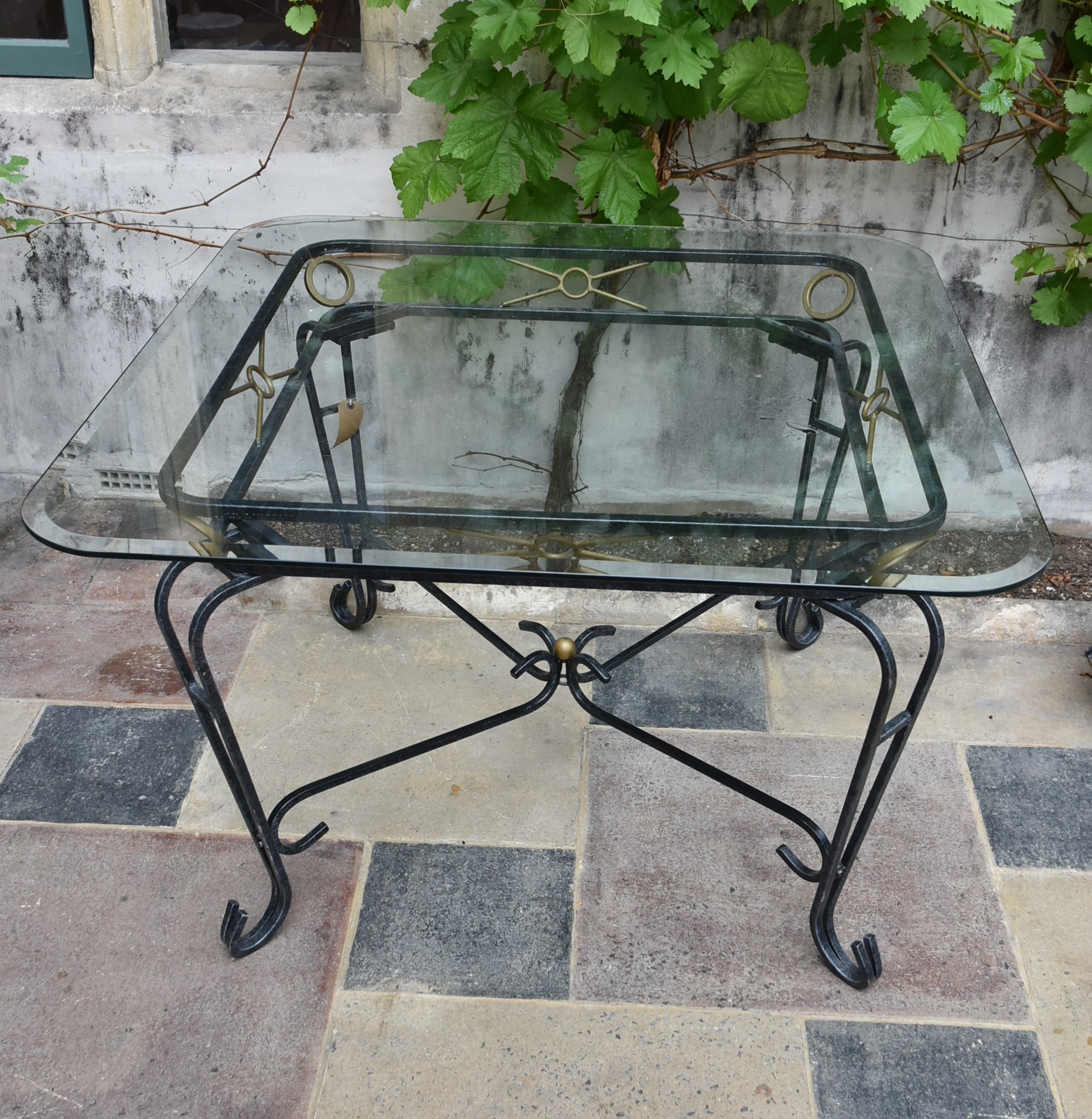A wrought iron conservatory dining table with bevelled plate glass top. H.73 W.115cm - Image 2 of 5