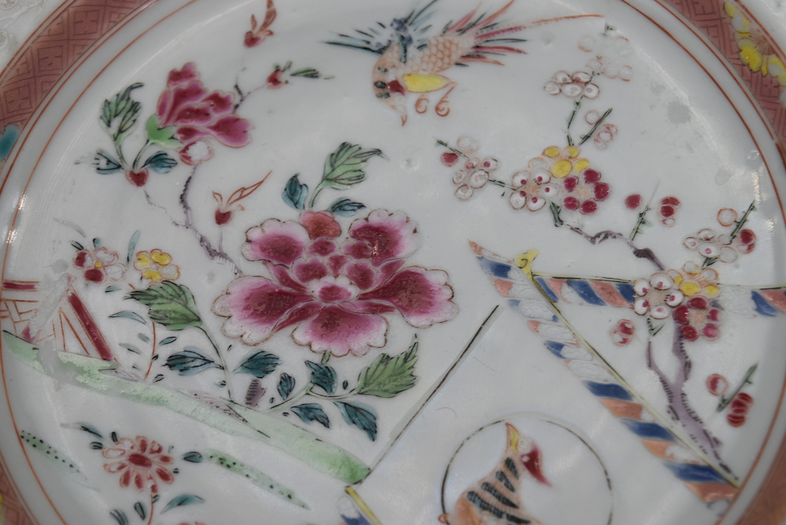 An 18th century Famille Rose Chinese glazed porcelain plate with cuckoo and house design with - Image 2 of 5