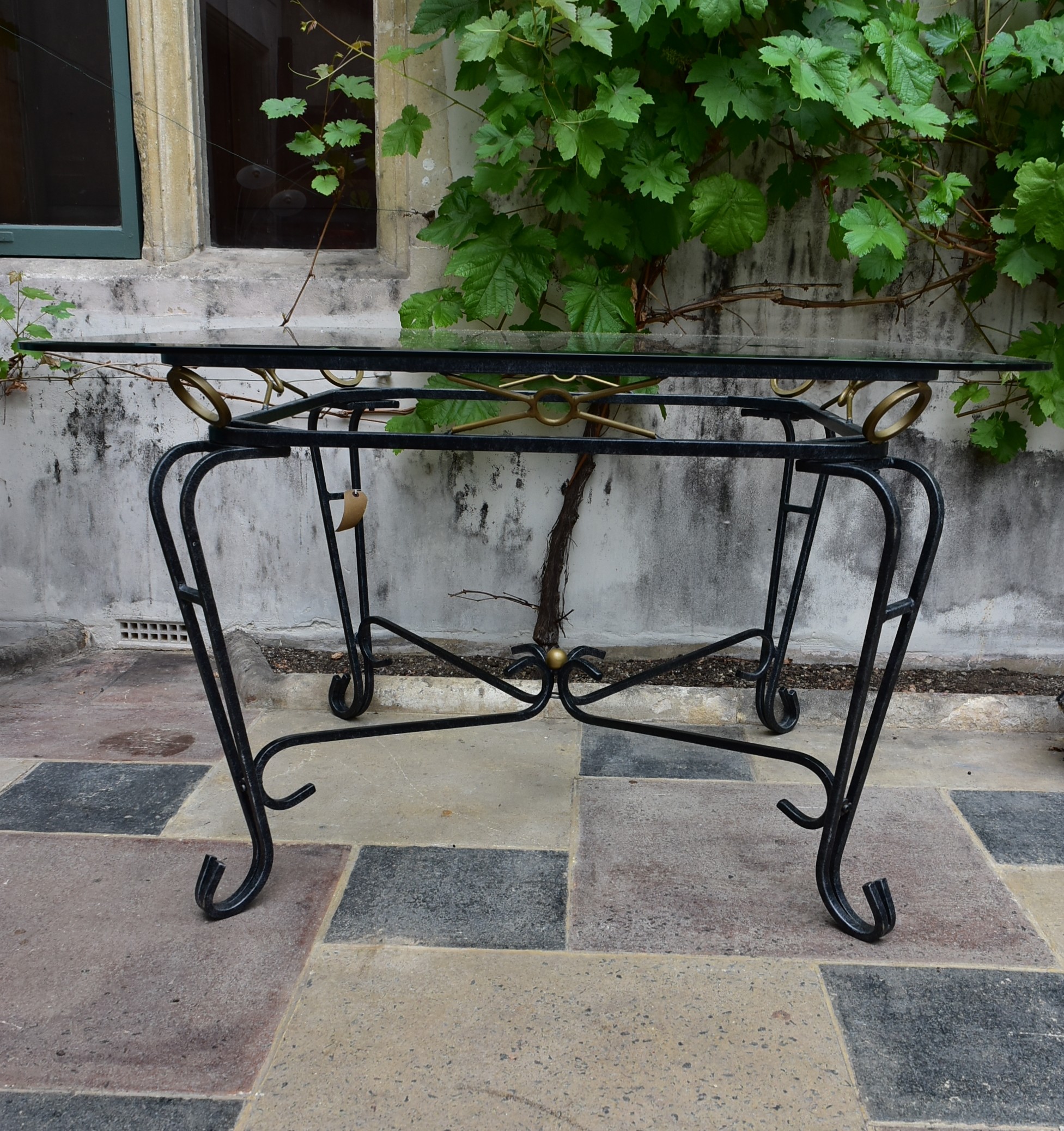 A wrought iron conservatory dining table with bevelled plate glass top. H.73 W.115cm - Image 4 of 5