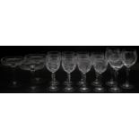 A collection of fourteen glasses. Including a set of four cut crystal wine glasses, three