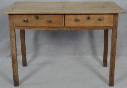 A 19th century fruitwood side table with a pair of frieze drawers on square section supports. H.77