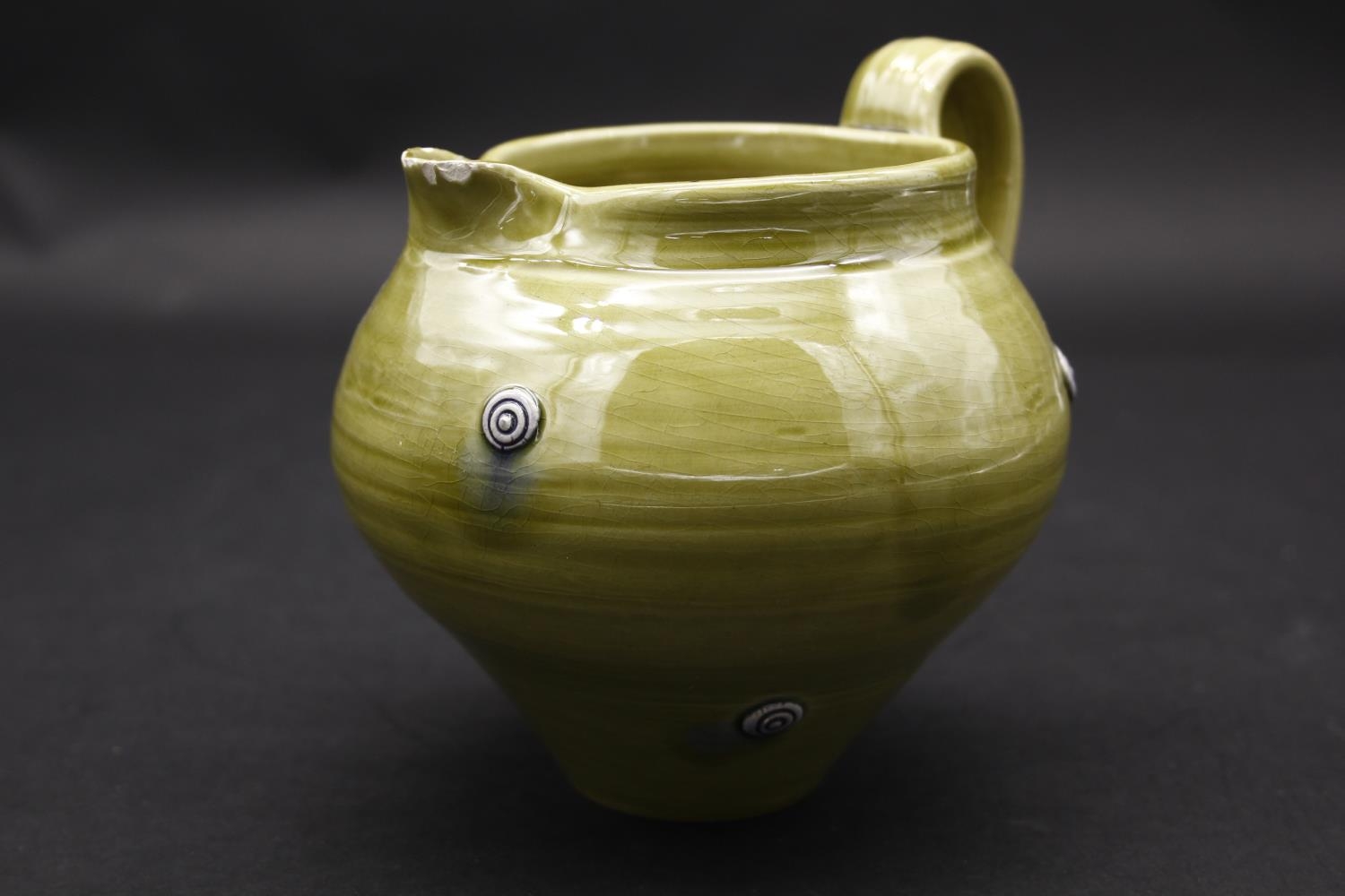 Three pieces of Art Pottery and a Murano style glass bowl. A green glaze jug with roundels, a - Image 3 of 8