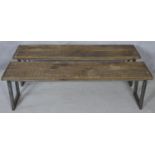 A pair of metal framed refectory benches with planked tops. H.45.5 L.150 W.31.5cm