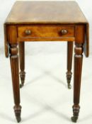 A small late Georgian mahogany drop flap Pembroke table with end drawer on tapering reeded