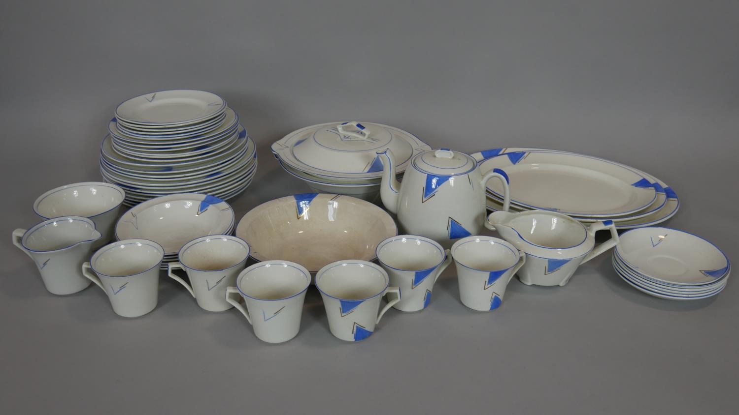 A hand decorated Art Deco part dinner service to include twelve plates, marked 'Cumberland' C J