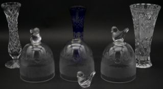 Two cut crystal vases, a Bohemian cobalt blue cut to clear vase and three engraved glass dome covers