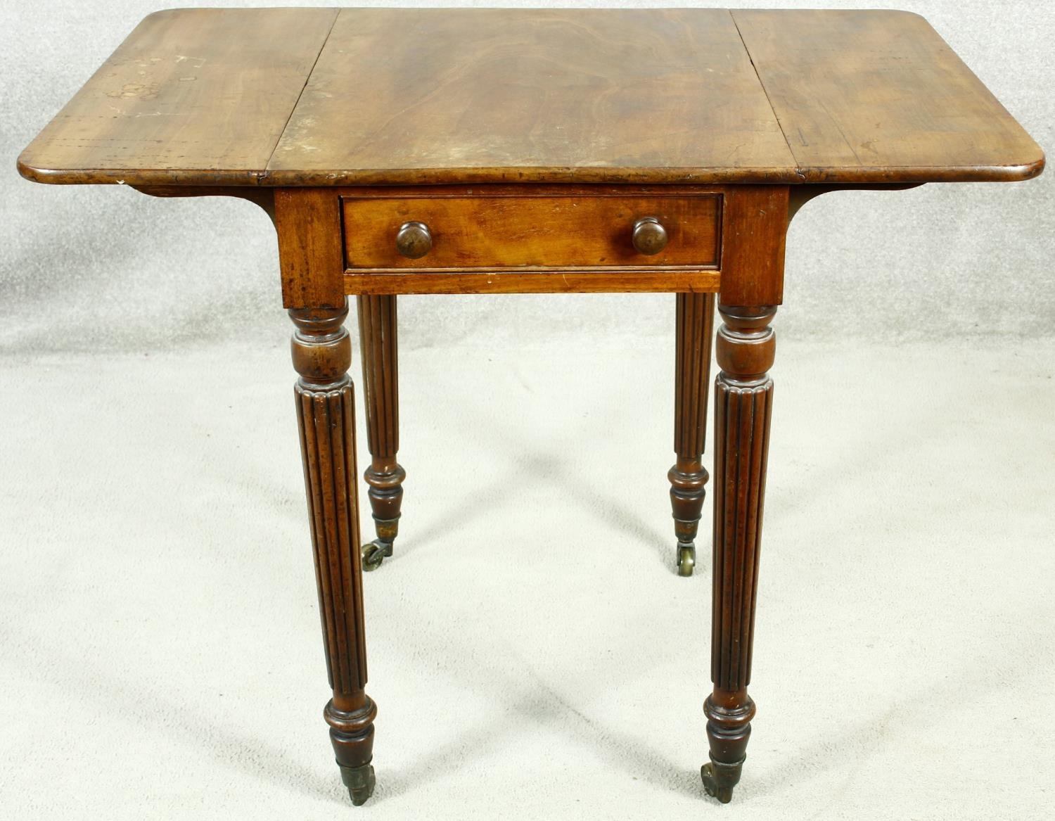 A small late Georgian mahogany drop flap Pembroke table with end drawer on tapering reeded - Image 2 of 6