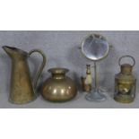 A vintage brass shaving mirror on stand, a brass cased lantern and a brass jug and vase. H.39cm (