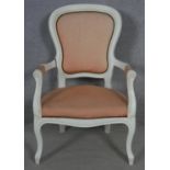 A white painted French style open armchair on cabriole supports. H.99.5cm