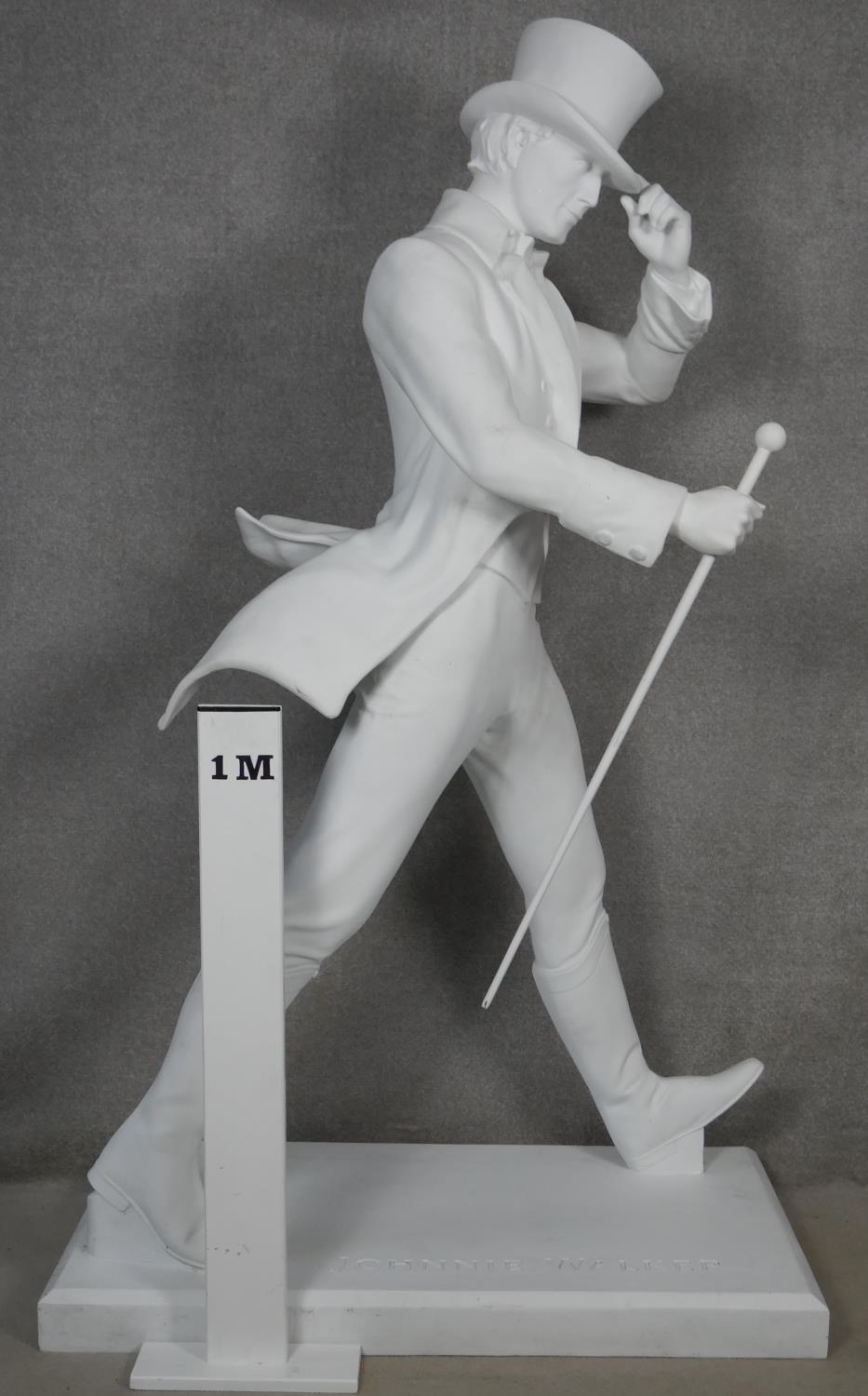 A life size white fibreglass figure of Johnnie Walker on a rectangular base, stamped Johnnie Walker. - Image 4 of 5