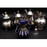 Three silver plated coffee pots, a ceramic coffee pot with plated mounts along with a silver